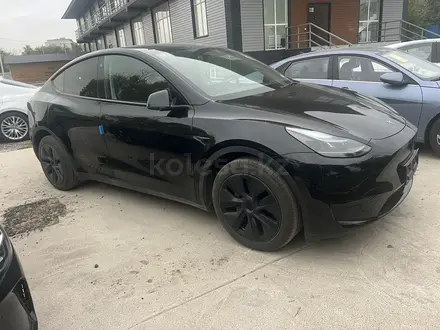 Tesla Model Y 2024 года за 21 500 000 тг. в Алматы – фото 2