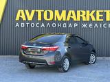 Toyota Corolla 2015 года за 7 350 000 тг. в Актобе – фото 3