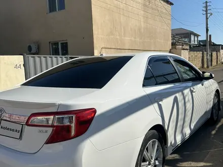 Toyota Camry 2013 года за 10 800 000 тг. в Жанаозен – фото 5