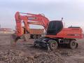 Doosan  DX210W 2012 годаүшін35 000 000 тг. в Тараз