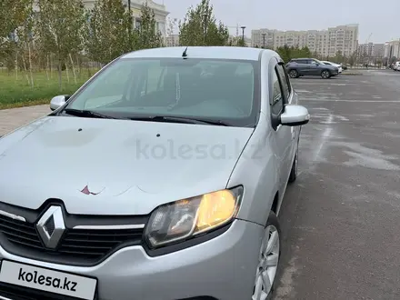 Renault Logan 2014 года за 2 700 000 тг. в Астана – фото 7