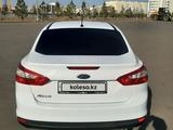 Ford Focus 2013 года за 2 600 000 тг. в Астана – фото 4