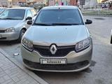 Renault Logan 2014 года за 2 800 000 тг. в Актобе – фото 2