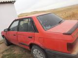 Mazda 323 1989 года за 550 000 тг. в Сарыозек – фото 4