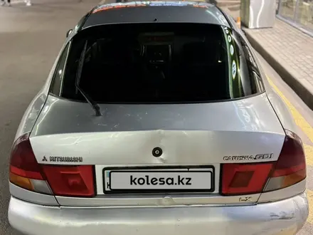 Mitsubishi Carisma 1998 года за 850 000 тг. в Алматы – фото 3