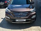 Hyundai Santa Fe 2014 годаүшін10 036 382 тг. в Атырау