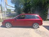 Mazda 323 2002 года за 1 500 000 тг. в Алматы – фото 4