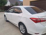 Toyota Corolla 2013 года за 6 700 000 тг. в Актобе – фото 4
