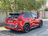 Toyota RAV4 2021 года за 13 700 000 тг. в Алматы