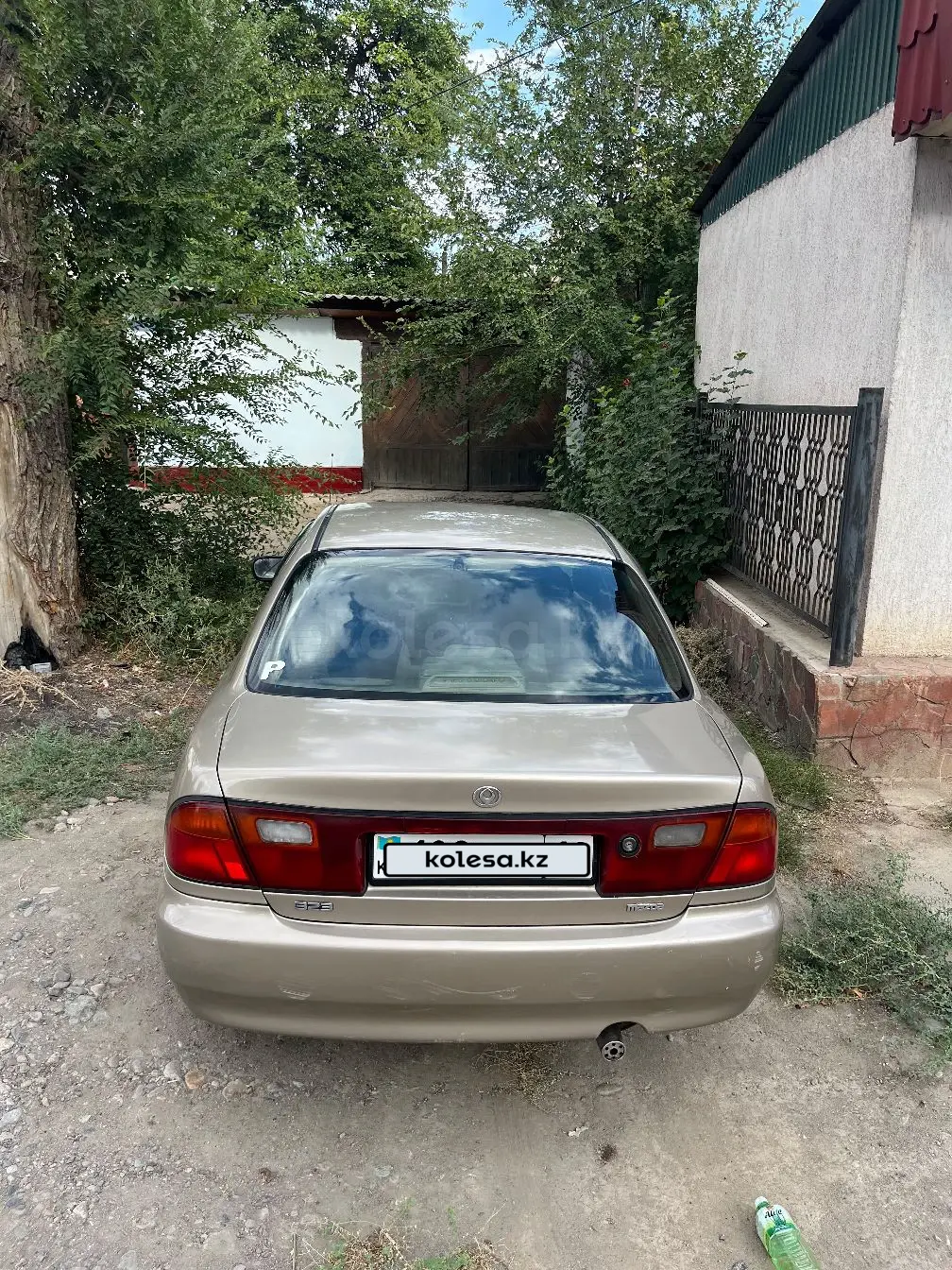 Mazda 323, 1998