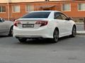 Toyota Camry 2014 годаүшін9 500 000 тг. в Актау – фото 19