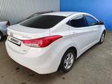 Hyundai Elantra 2013 года за 3 995 100 тг. в Актобе – фото 4
