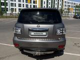 Nissan Patrol 2013 года за 19 000 000 тг. в Астана – фото 3