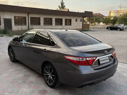 Toyota Camry 2017 года за 7 300 000 тг. в Жанаозен – фото 16