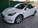 Tesla Model Y 2021 года за 19 950 000 тг. в Алматы – фото 2