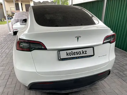 Tesla Model Y 2021 года за 19 950 000 тг. в Алматы – фото 52