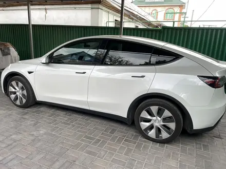 Tesla Model Y 2021 года за 19 950 000 тг. в Алматы – фото 53