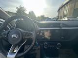 Kia Rio X-Line 2021 года за 7 500 000 тг. в Актобе – фото 5