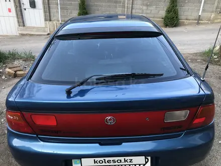 Mazda 323 1998 года за 1 400 000 тг. в Алматы – фото 7