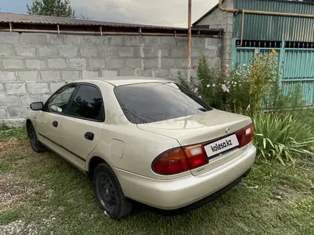 Mazda 323 1997 года за 2 000 000 тг. в Алматы – фото 2