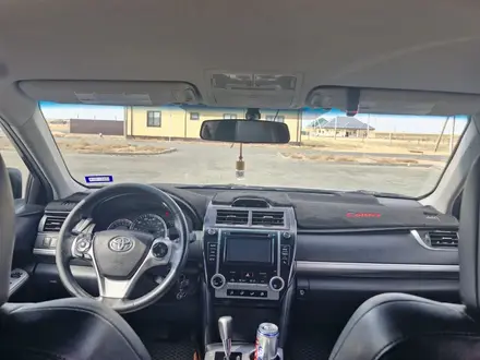 Toyota Camry 2014 года за 5 500 000 тг. в Кульсары – фото 5