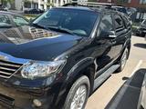 Toyota Fortuner 2014 года за 9 800 000 тг. в Астана – фото 4