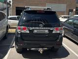 Toyota Fortuner 2014 года за 9 800 000 тг. в Астана – фото 5