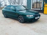 Mazda 626 1997 года за 1 700 000 тг. в Актобе – фото 2