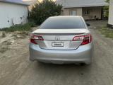 Toyota Camry 2013 года за 4 500 000 тг. в Кульсары – фото 4