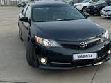 Toyota Camry 2014 года за 5 700 000 тг. в Актобе – фото 4