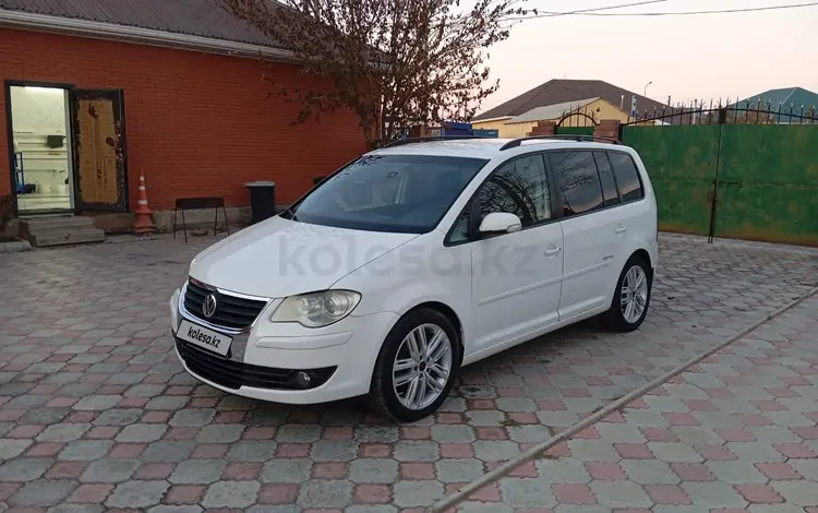 Volkswagen Touran 2009 годаfor2 600 000 тг. в Атырау