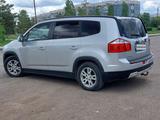 Chevrolet Orlando 2013 года за 4 800 000 тг. в Караганда – фото 4