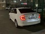 Skoda Rapid 2013 года за 3 000 000 тг. в Астана – фото 2