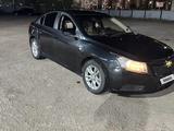 Chevrolet Cruze 2013 года за 2 700 000 тг. в Караганда – фото 2