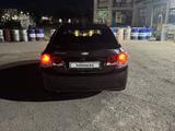 Chevrolet Cruze 2013 года за 2 700 000 тг. в Караганда – фото 5