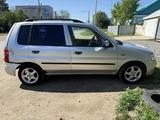 Mazda Demio 2001 года за 1 400 000 тг. в Актобе – фото 3