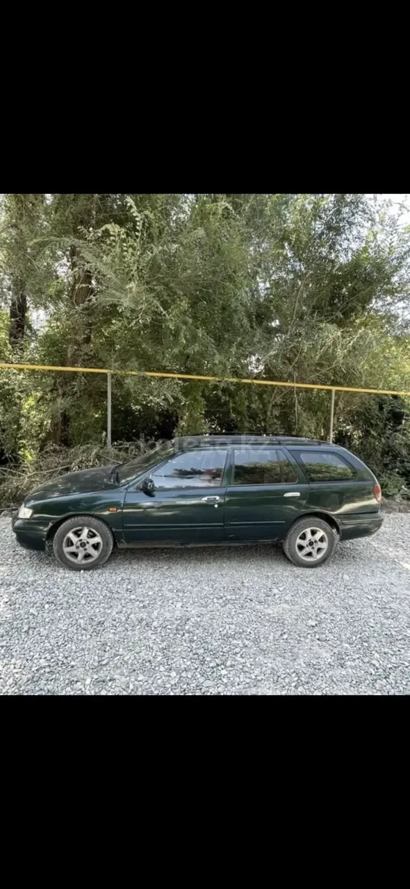 Nissan Primera, 1998