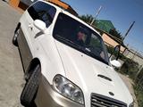 Kia Carnival 2003 года за 2 800 000 тг. в Шымкент – фото 2