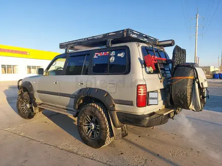 Toyota Land Cruiser 1997 года за 6 000 000 тг. в Атырау – фото 2