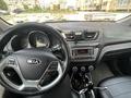 Kia Rio 2015 года за 6 150 000 тг. в Актобе – фото 10