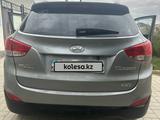 Hyundai Tucson 2012 годаfor7 200 000 тг. в Актау – фото 4