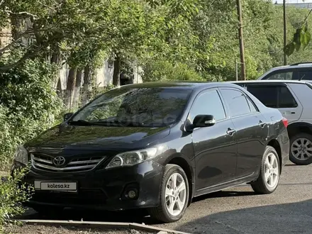 Toyota Corolla 2013 года за 6 630 000 тг. в Караганда