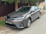 Toyota Corolla 2018 года за 8 300 000 тг. в Уральск – фото 2