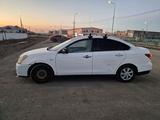 Nissan Almera 2014 года за 1 900 000 тг. в Атырау – фото 2