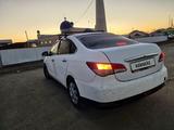 Nissan Almera 2014 года за 1 900 000 тг. в Атырау – фото 4