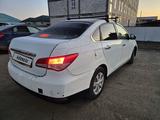 Nissan Almera 2014 года за 1 900 000 тг. в Атырау – фото 5