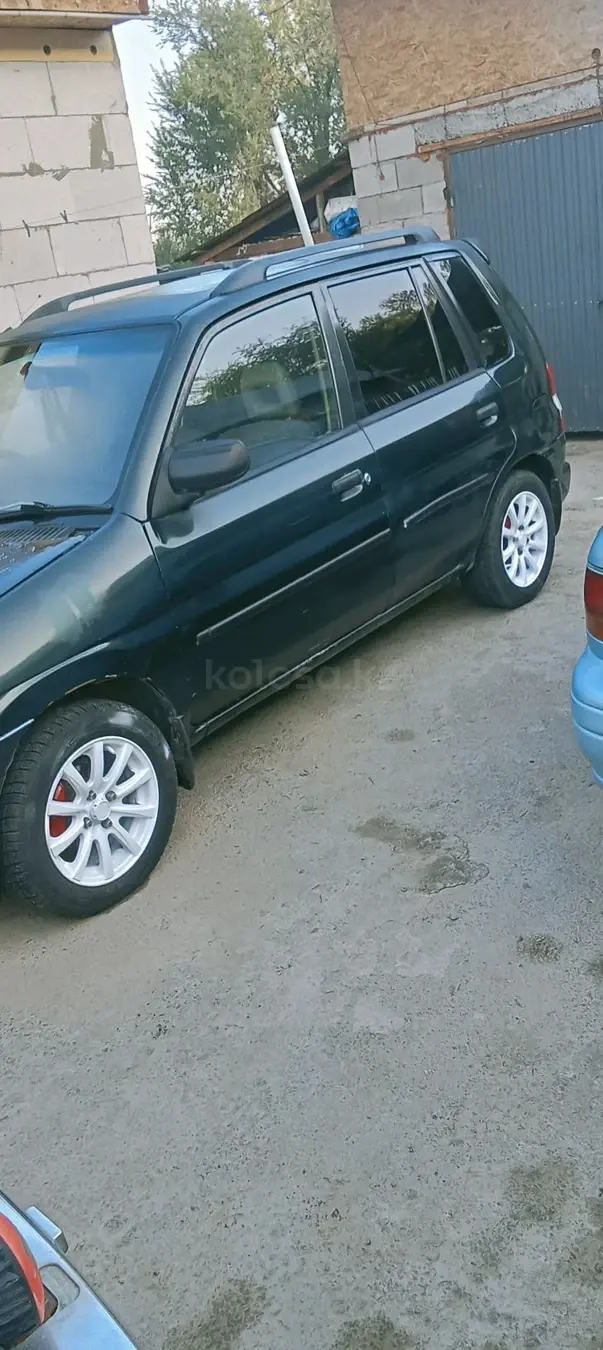 Mazda Demio, 1997