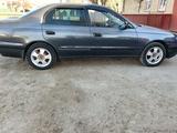 Toyota Carina E 1994 года за 2 000 000 тг. в Айтеке би – фото 4