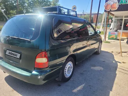 Kia Carnival 1998 года за 2 700 000 тг. в Тараз – фото 6