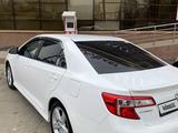 Toyota Camry 2014 годаfor8 800 000 тг. в Алматы